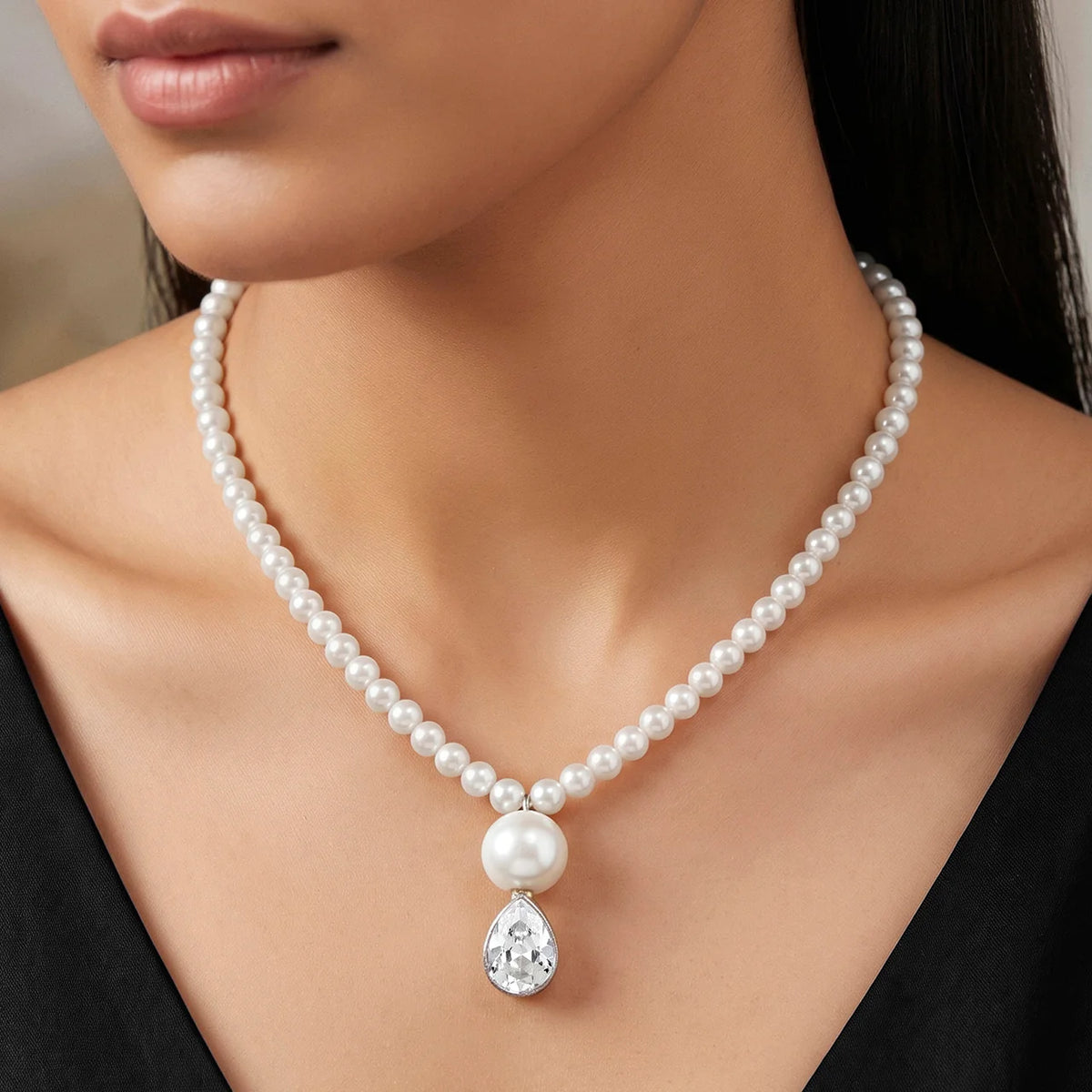 AYMI Necklace Elegant Pearls &
Crystal Pendant